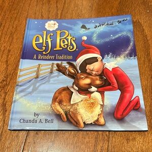 Elf Pets a Reindeer Tradition book
